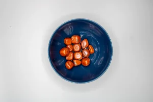 Poleret Rød Jaspis Lommesten - SoulCandy.dk
